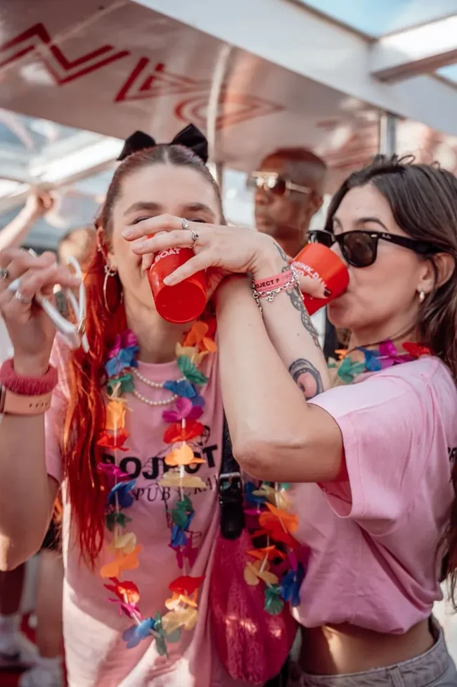 Friends drinking together on the Porto Party Boat